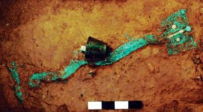 turquoise dragon and bronze bell that were unearthed in 2002