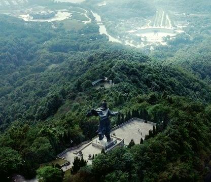 Great Yu Statue on Shifan Hill with the Da Yu Memorial Hall and Jiyu Square visible in the distance