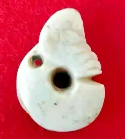 the famous Nihewan jade pig dragon that is on display at the museum