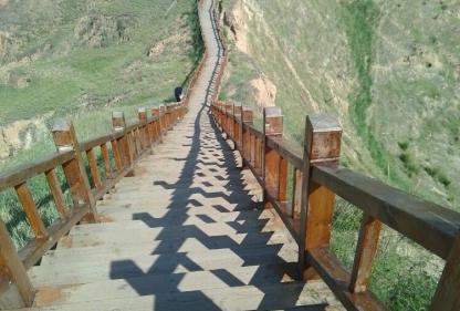 elevated wooden walkway leading around the Nihewan National Nature Reserve