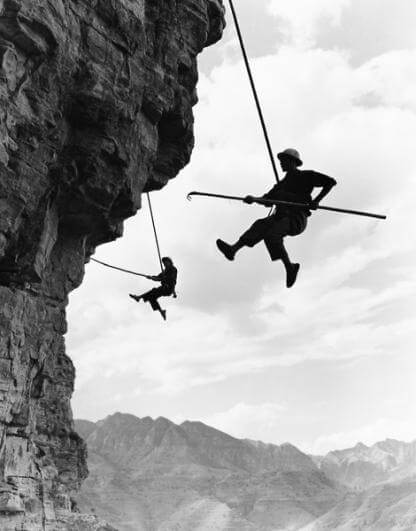 workers dangling from ropes during the construction phase of the Red Flag Canal in 1960