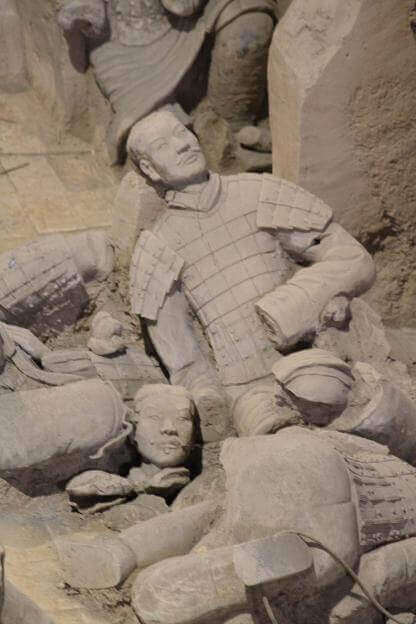 damaged terracotta warrior statues inside pit 2 of the Museum of the Terracotta Warriors and Horses