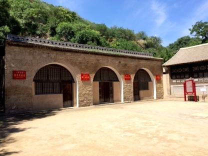 view of the cave dwellings at the revolutionary site at the foot of Fenghuang Mountain in Yan'an
