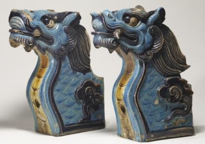 ceramic-glazed temple beam ends in the shape of dragons from the 16th century
