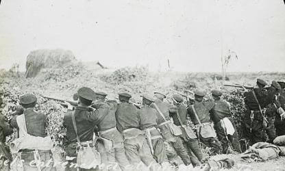photo of rebel soldiers firing at imperial Qing troops during the Wuchang Uprising in AD 1911