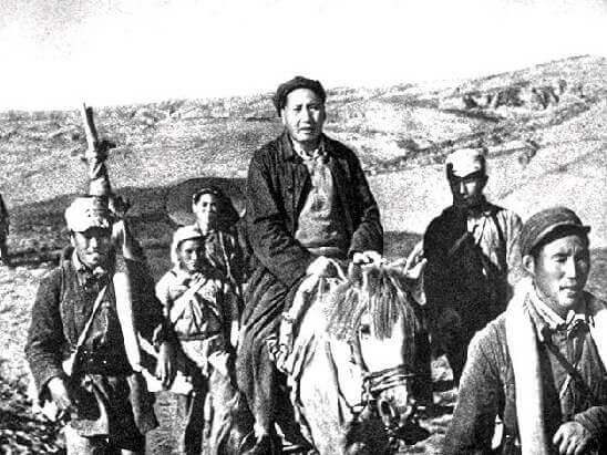 photo showing Mao Zedong riding his white horse during the Long March, 1934-1935