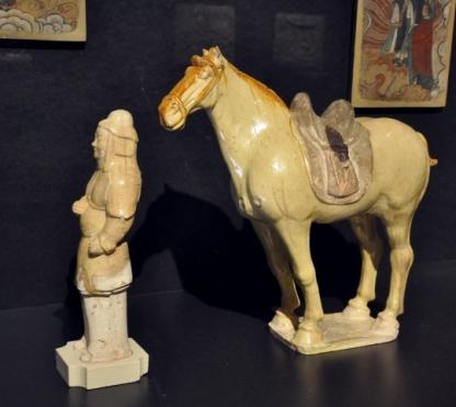 clay figures of a warrior (Sui dynasty) and horse (Tang dynasty)